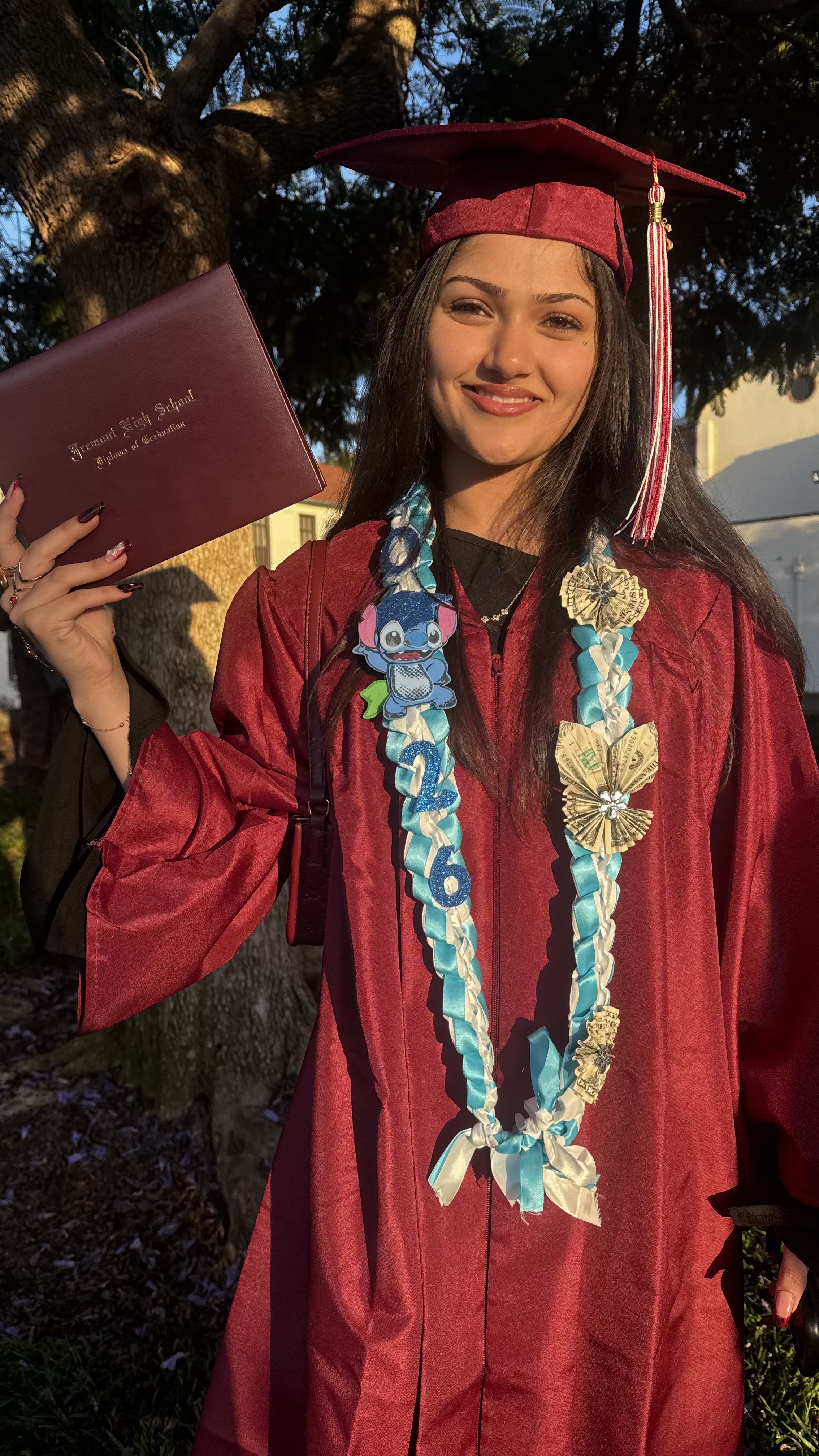 Jasmine Far graduation portrait in 2026